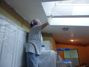 Good bones equals skylights in the kitchen. White paint reflects light and you can wash it now. 