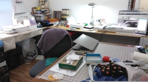 Organized chaos in the sewing room. Both machines working at the same time while I addressed cards. 