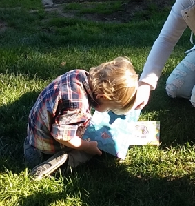 He can't see the books well but he loves them. Great grandson 