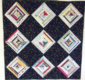 Emily's selvedge quilt. Made of strips from the edges of fabric 