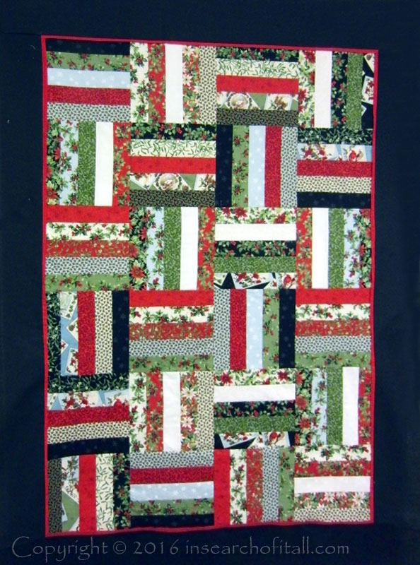 jelly roll Christmas quilt done in record time. 